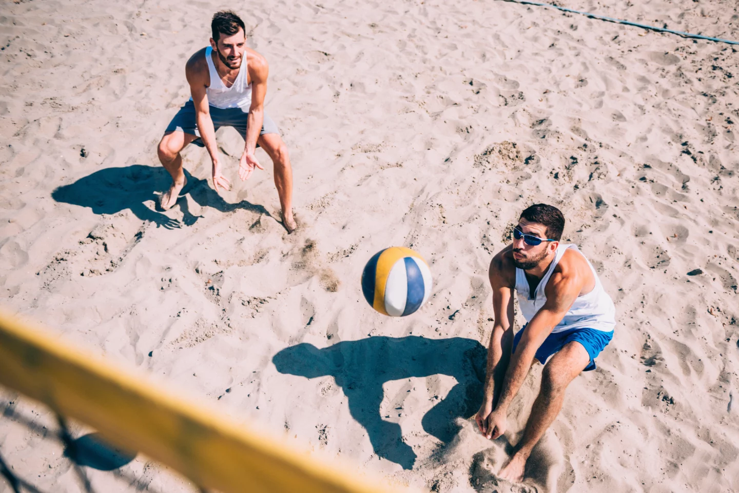 coworker's game of beach volleyball