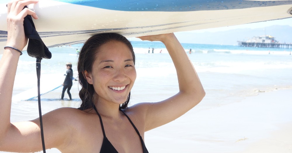 women posing at a bachelorette party group surfing lesson near malibu