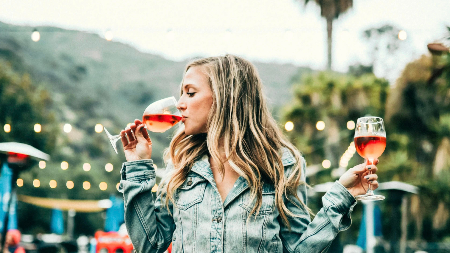 woman drinking rose on a malibu wine tasting tour