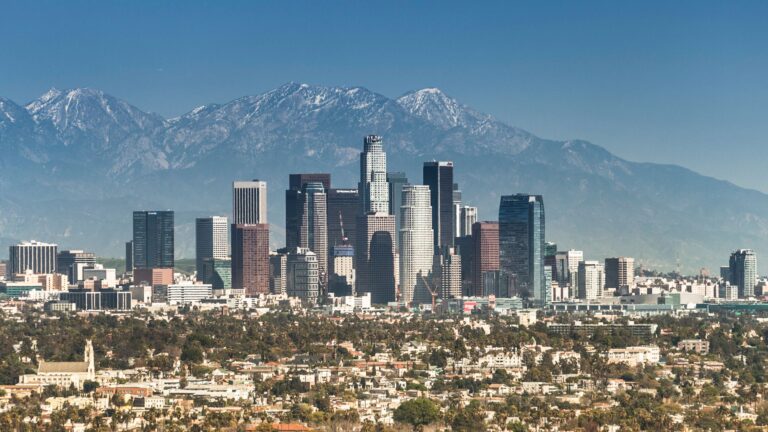 LA Skyline with Snowcapped Mountains