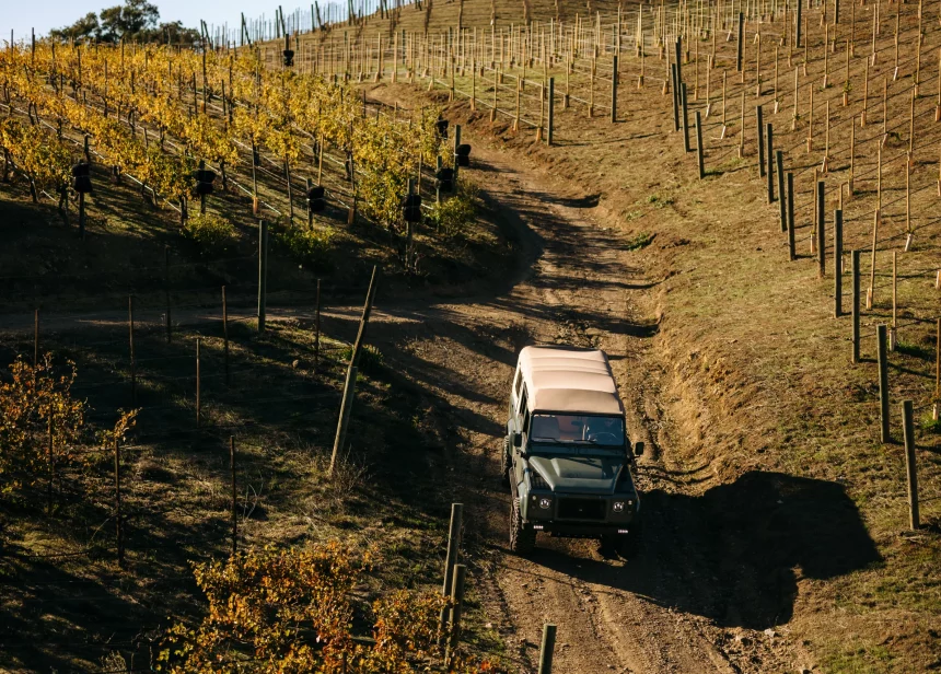 4x4 vehicle driving on vineyard during wine tour