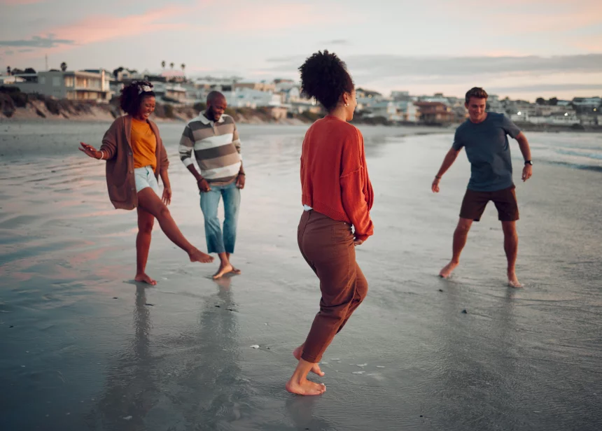 coworkers walking on the beach in malibu